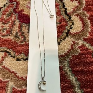 Silver and gold moon and star necklace